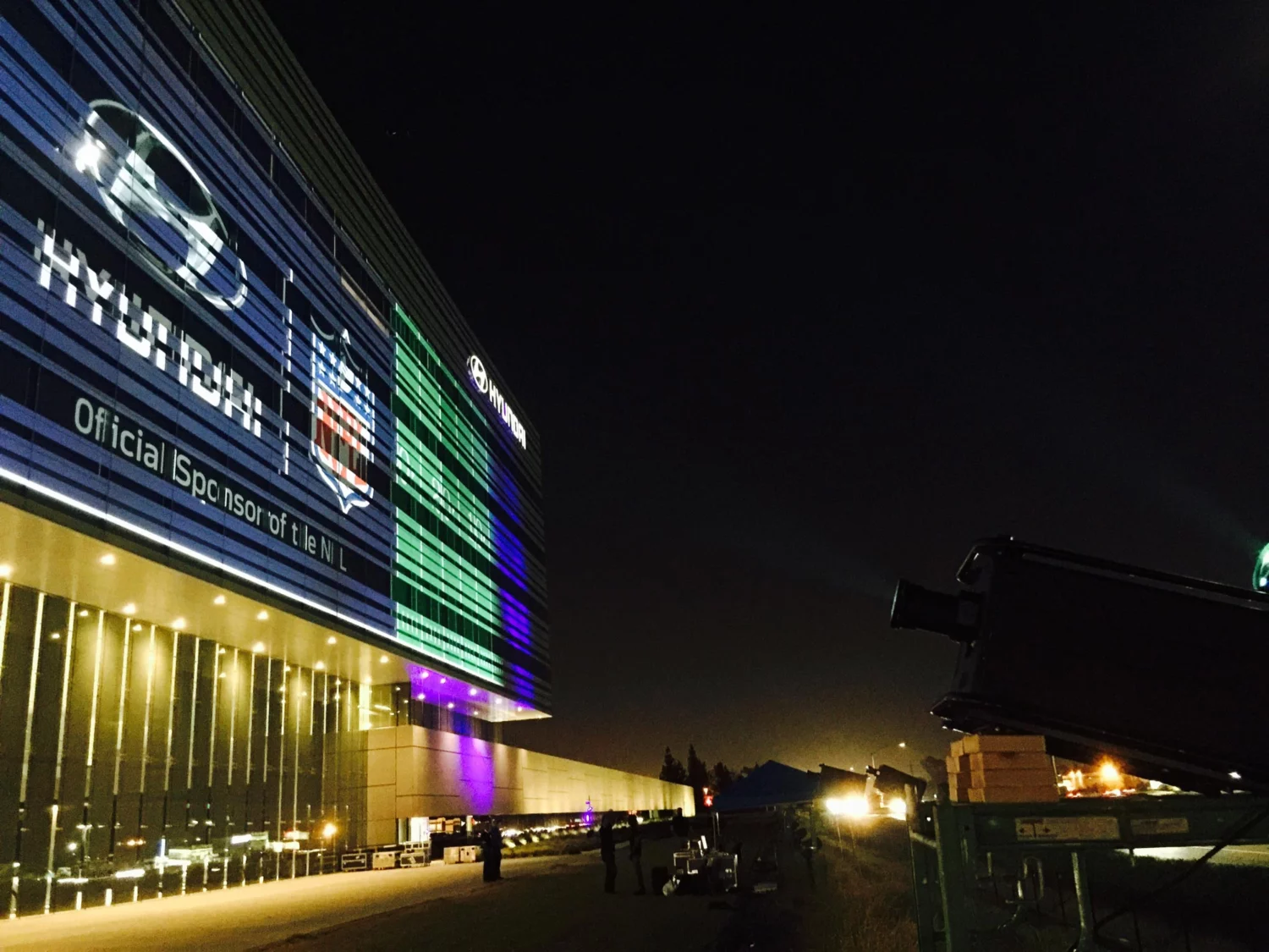 Closer view of projection mapping on Hyundai building for NFL