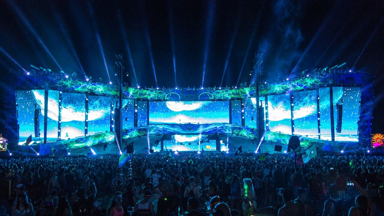 Image of EDC stage with LED panels and vibrant lighting